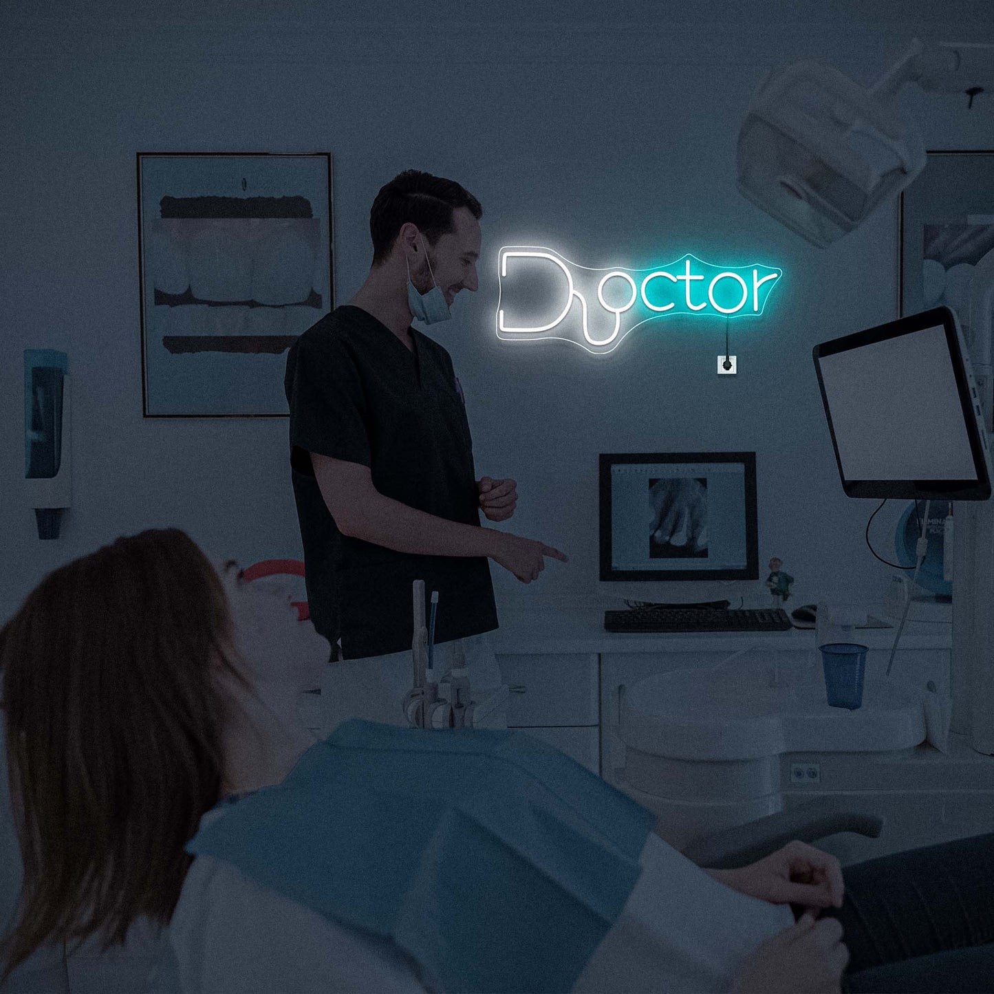 Modern Doctor neon LED sign glowing in a dental clinic.