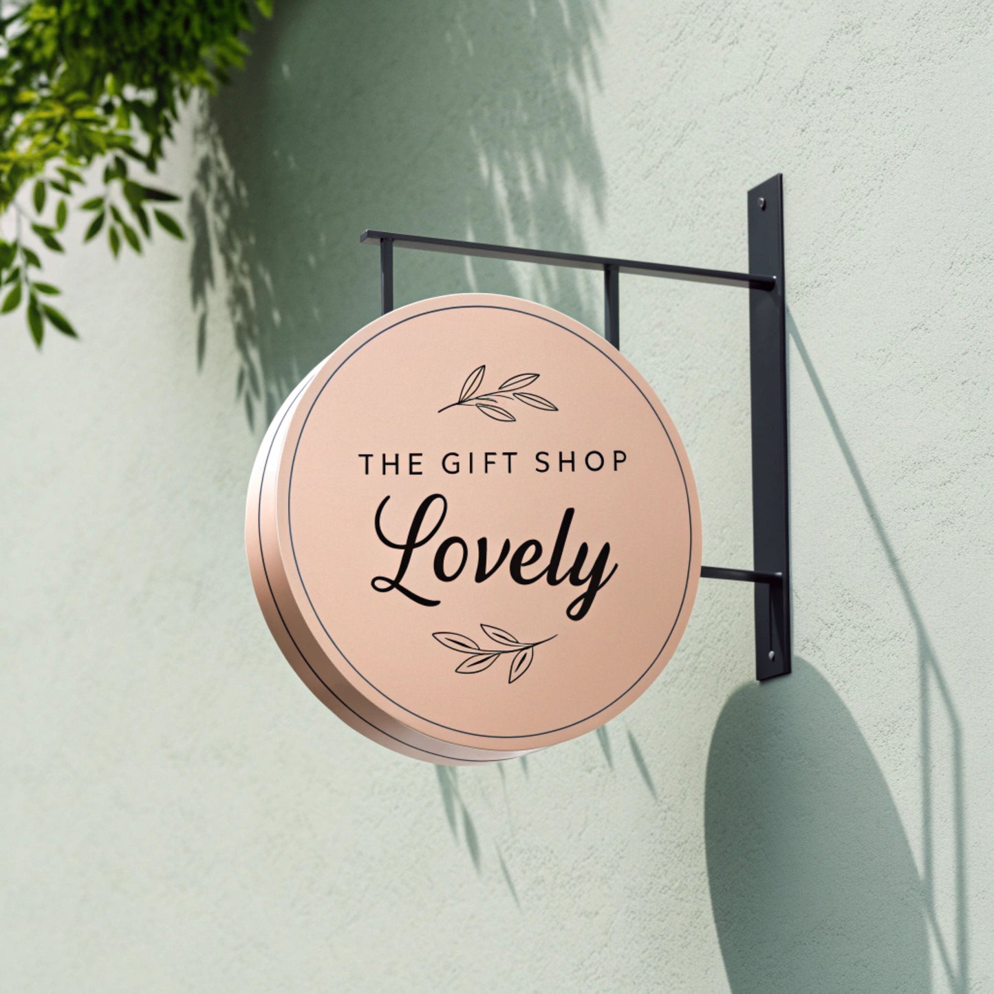 Round sign for 'The Gift Shop Lovely' 

