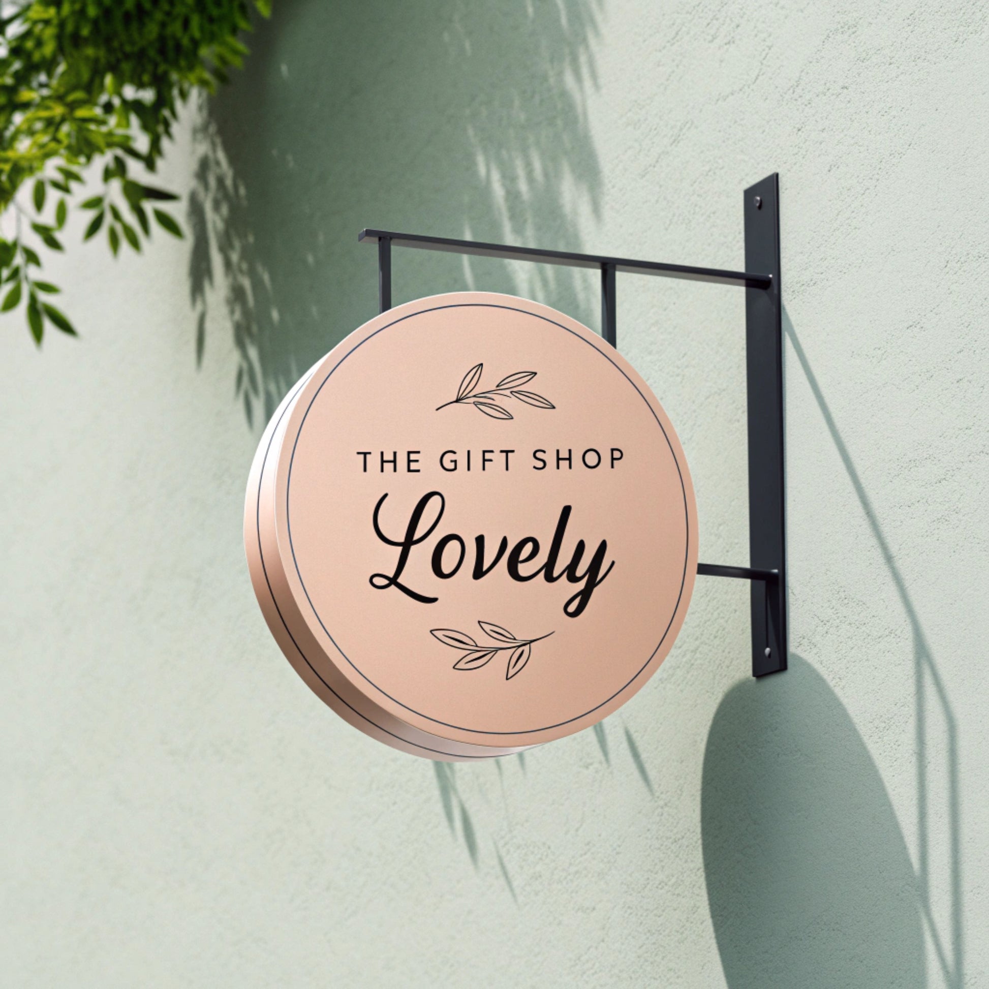 Round sign for 'The Gift Shop Lovely' 

